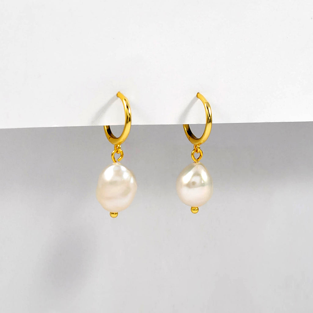 18k gold plated 925 Sterling Silver ‘Classic Hoop Baroque Pearl Earrings’ Earrings with Latch closure hanging on white background